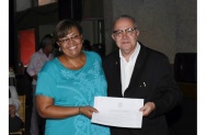O Reitor Prof. Pe. Josafá faz a entrega do diploma de Honra ao Mérito a Digerlaine Gomes Tenório. Acervo Núcleo de Memória. O Reitor Prof. Pe. Josafá faz a entrega do diploma de Honra ao Mérito a Digerlaine Gomes Tenório. Acervo Núcleo de Memória.